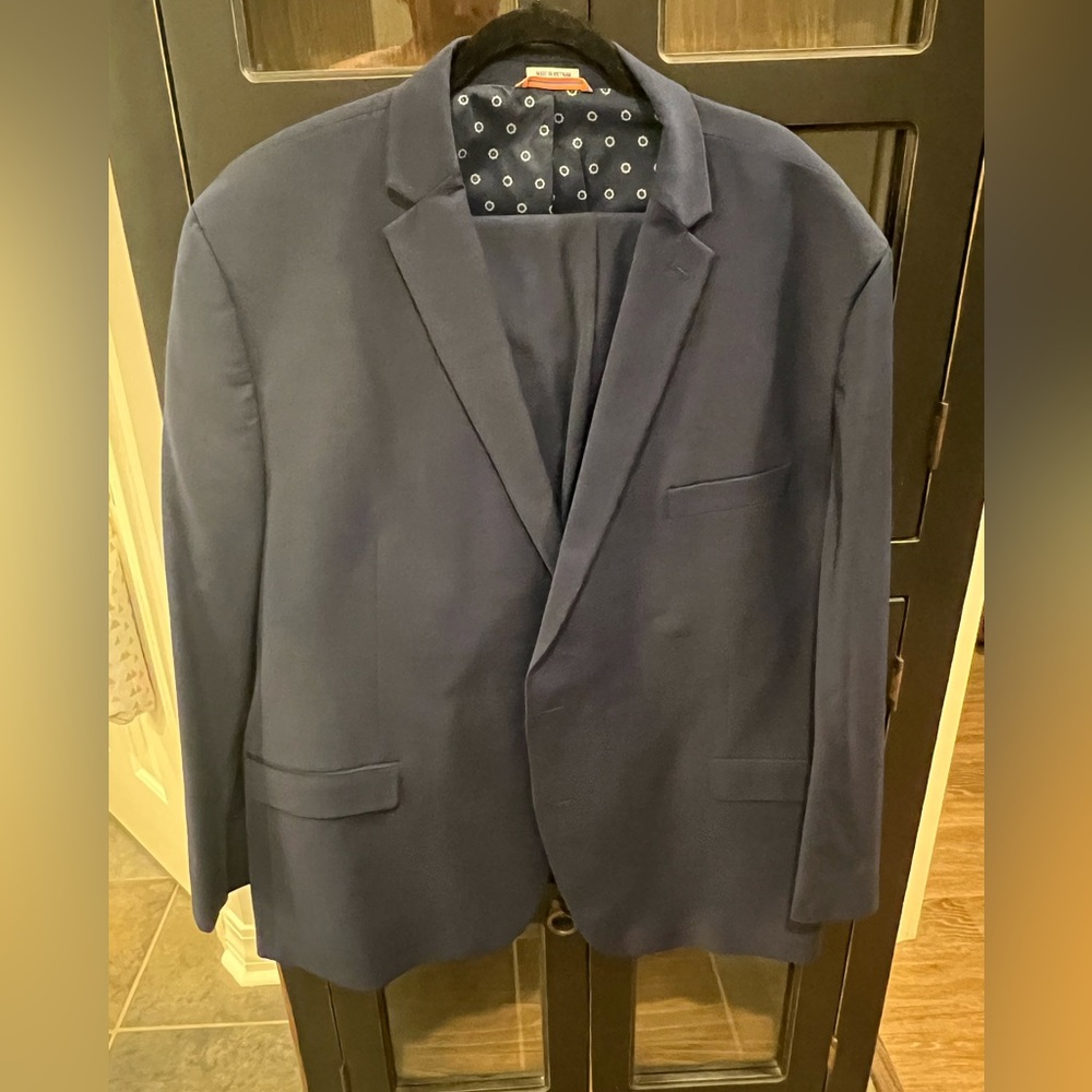 Brown and Ivy blue suit. Like new condition.